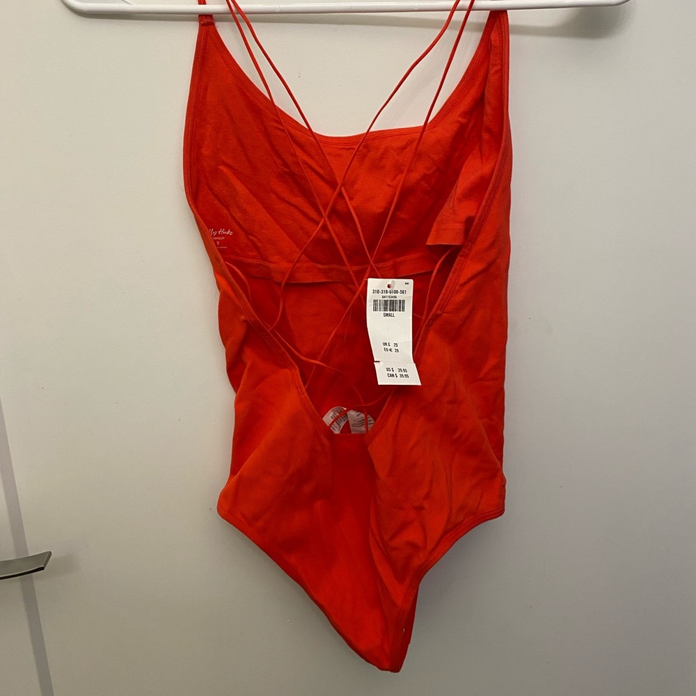 Brand new with tags Holister Gilly hicks pink body suit size small